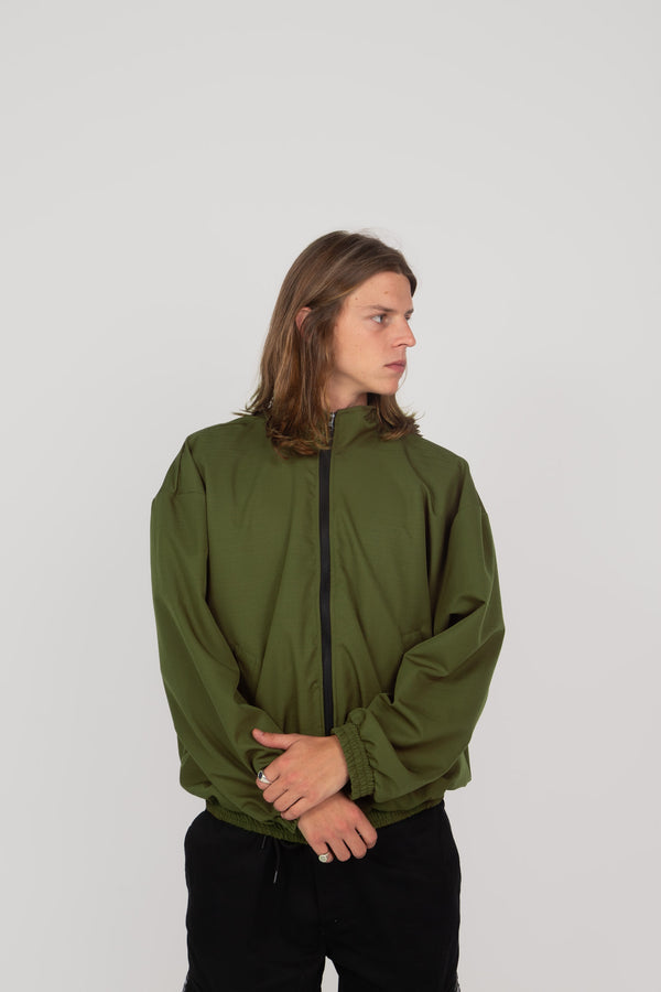 Corta Vento Overcome RipStop "Collar Neck" Verde Militar