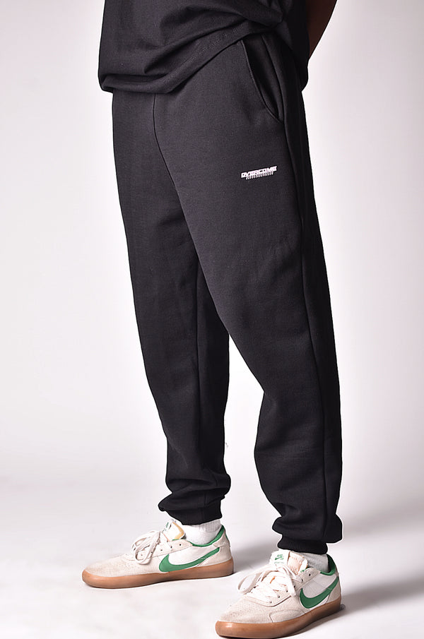 Calça Moletom Overcome Domination Smile Preta