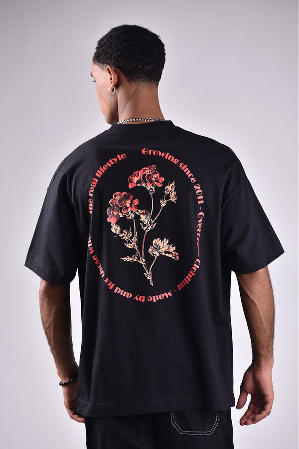 Camiseta Overcome Oversized Round Flower Preta